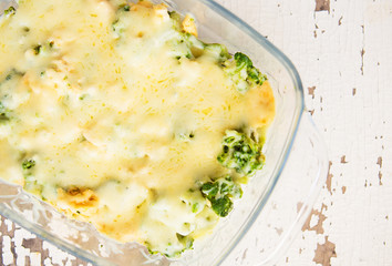 delicious broccoli casserole with cheese and cream, close-up