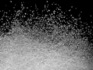 Sugar crystals texture isolated on black background.