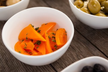 Close up of orange bell pepper slices in bowl