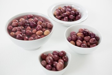 Close-up of pickled olives in bowls