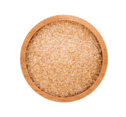 Brown sugar in wooden bowl on white background