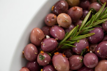 Olives garnished with rosemary