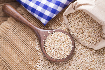 Grains of quinua on wood - Chenopodium quinoa