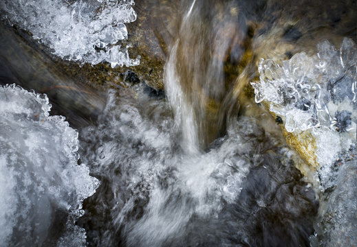 Little Waterfall in an Icy Mountain Brook
