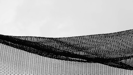 silhouette of fishing net - monochrome