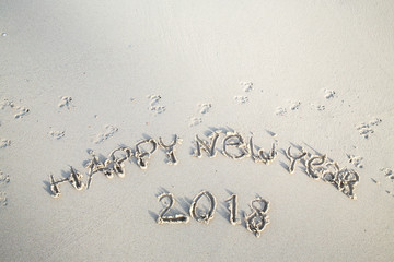 Happy New Year 2018, lettering on the beach, Year of the Dog2018