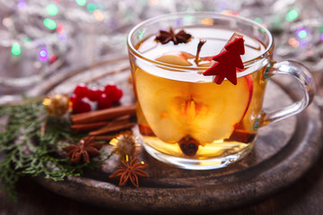 Apple Cider Drink,Juice,Cider with Spices ,Cinnamon sticks and fresh Apples.Hot drink for Autumn and Winter Christmas evenings.selective focus.