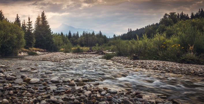 Bela River with Krivan Peak at Sunset in Slovakia