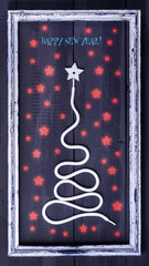 Sign symbol Christmas tree on a wooden background. A copy of space. The idea of a merry new year. Christmas.