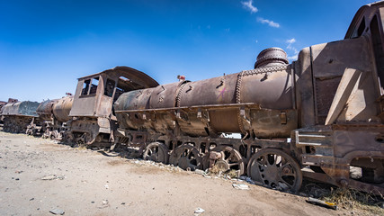 Rusty old train at the Train Cemetery in Uyuni desert, Bolivia, South America