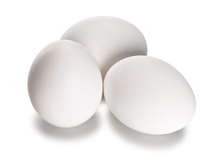 Three white eggs, close-up