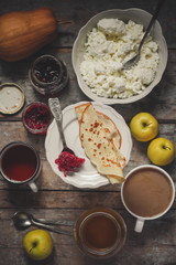 sweet pancakes with jam, cottage cheese and other - beautiful serving