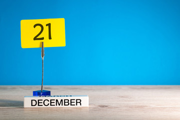 December 21st mockup. Day 21 of december month, calendar on blue background. Winter time. Empty space for text
