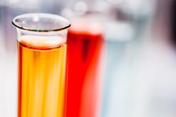 test tubes in laboratory. drug discovery, pharmacology and biotechnology concept. science and medical research background.