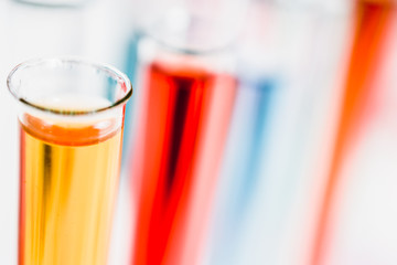 test tubes in laboratory. drug discovery, pharmacology and biotechnology concept. science and medical research background.