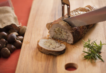 stuffed turkey breast on cutting board