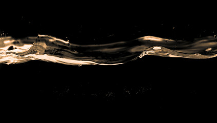 Water smooth with splashes on a black background