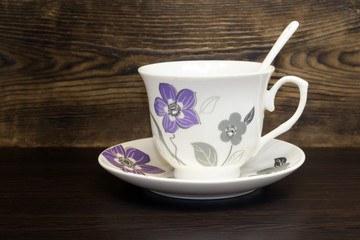 Empty cup of tea on a wooden table