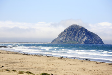 Fototapeta na wymiar Morro Rock in San Luis Obispo beach