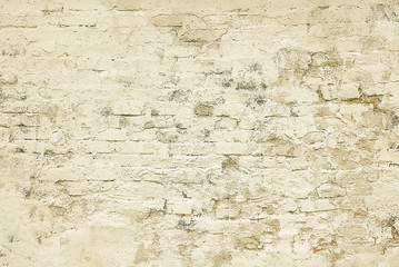 Old beige brick painted wall background texture
