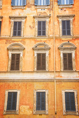 Fototapeta premium View of old building and windows in historical centre of Rome - Italy