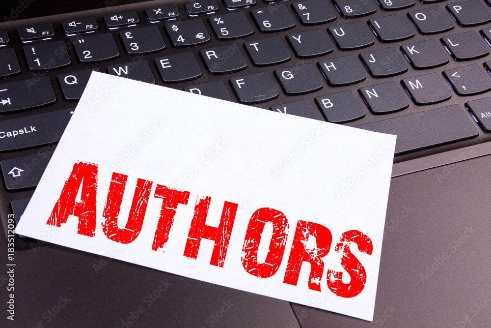 Poster writing authors text made in the office close-up on laptop computer keyboard. business concept for w
