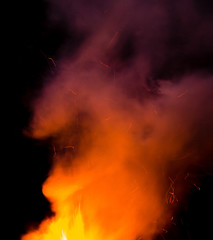 fire with smoke on a black background