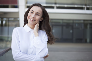 Fototapeta na wymiar Portrait of happy smiling business woman