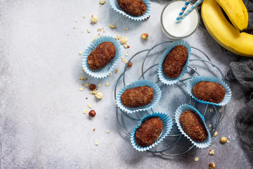 Cake of potatoes with banana granola and cottage cheese on a stone or slate background. Breakfast table. Top view with copy space.
