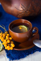 Sea buckthorn tea with lime, ready to drink.
