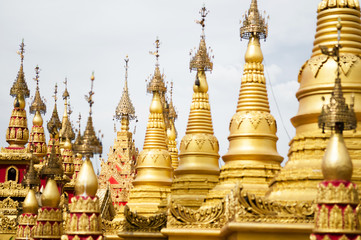 Fototapeta premium Simulate of Shwedagon Pagoda at Suwankiri Temple, Ranong, Thailand