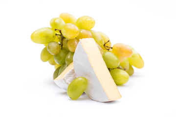 cheese with grapes isolated