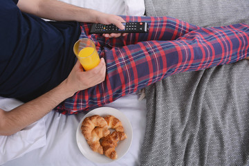 Man having breakfast in bed.