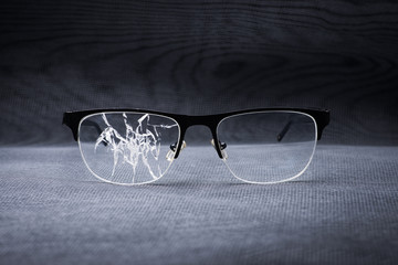 broken glasses on a metal background