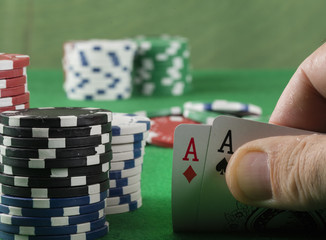 poker game with chips on green background
