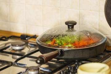Chopped vegetables on frying pan