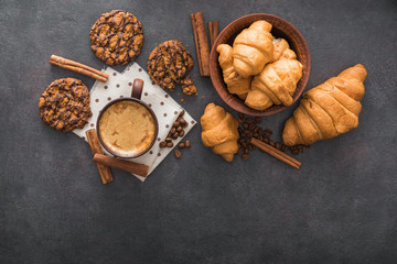 tasty coffee cup with sweet cookies
