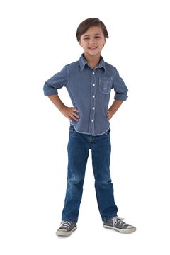 Boy posing against white background