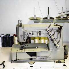 Sewing serger. The workplace of a seamstress.