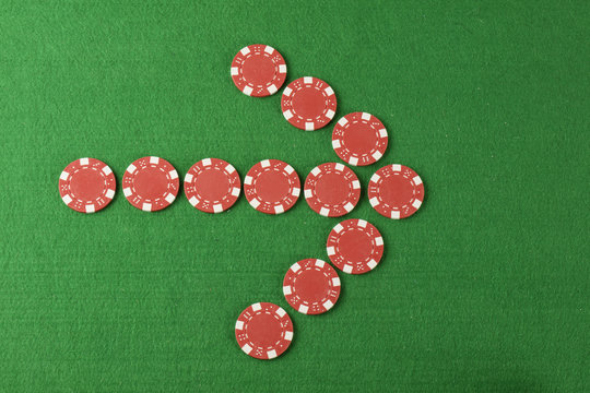 chips arrow pointing above green cloth
