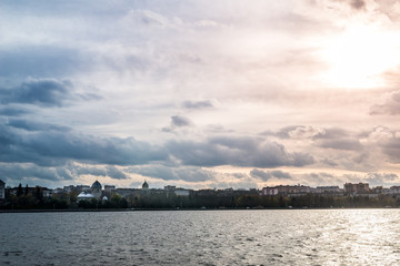 dramatic sunset sky at the lake in city
