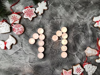 Date in calendar. December day. Christmas is coming. Advent. New Year and Christmas background. Number from candle light. Homemade Christmas cookies. 31 of December
