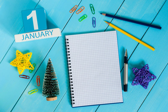 January 1st. Day 1 of january month, calendar on teacher workplace background. Winter time. Empty space for text