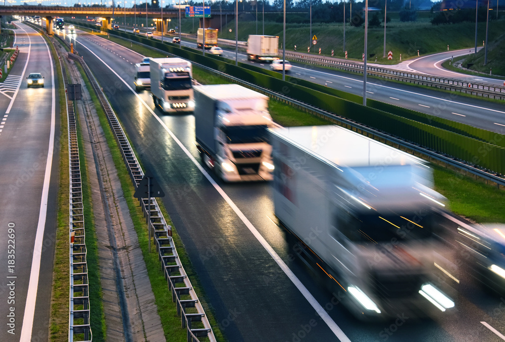 Wall mural Trucks on four lane controlled-access highway in Poland