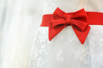 red bow on wedding dress