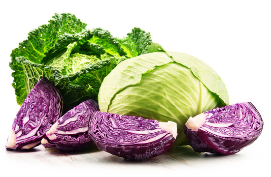 Fresh organic cabbage heads isolated on white