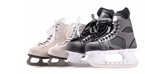Ice hockey skates and figure skates isolated on white