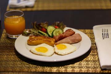 Breakfast served with orange juice and coffee.