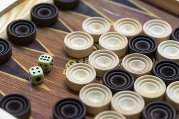 Wooden backgammon. Play a board game.