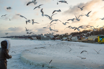 Icing. Winter natural disaster icing sea promenade after winter storm. Embankment of ocean during icing